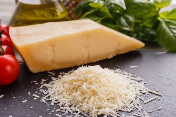istock fragrant grated Parmesan on a slate stone slicing board 1071096274