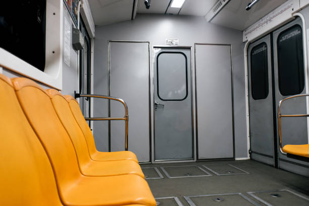 istock Kyiv metro wagon interior with no people and orange seats 1071097064