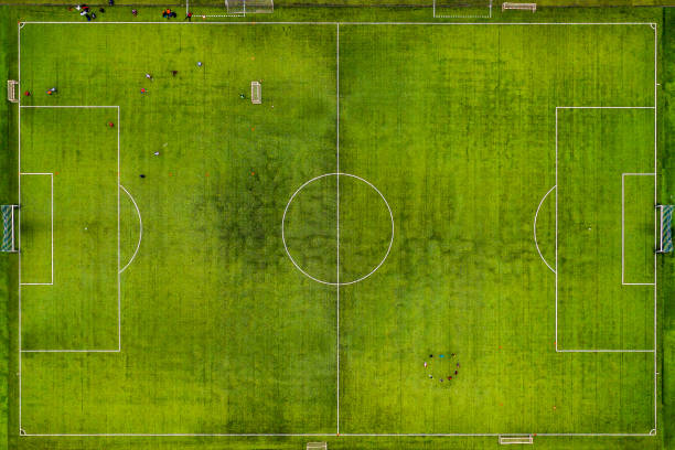 istock A stadium with a green soccer field, aerial view 1071099700