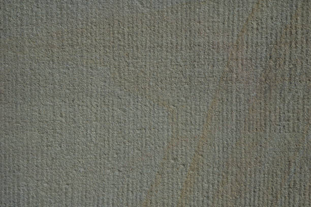 istock Rough natural stone seamless marble texture surface with cracks, dents, sharp edges. Gray grungy textured backdrop 1071100718