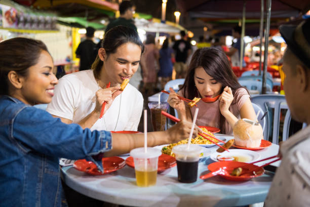 istock Eating at an Asian night market 1071102152