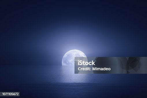 istock big moon over the sea at night 1071105672