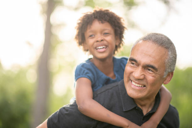 istock Grandpa piggyback ride 1071109252
