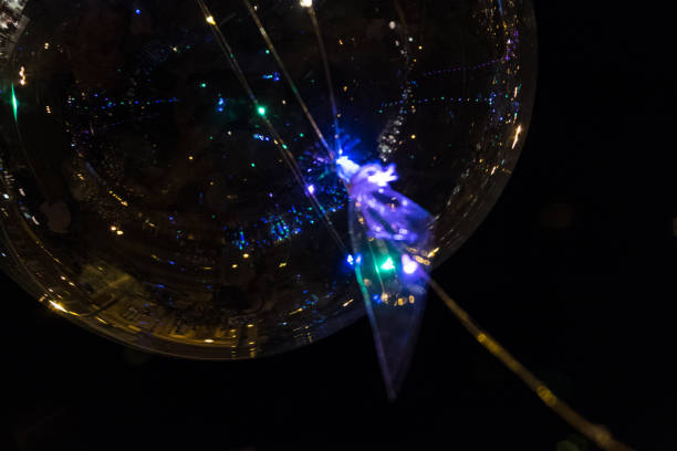 istock LED transparent balloon with illuminated garlands close-up. 1071113548