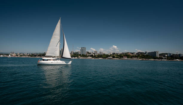 istock White yacht sailing in the open sea 1071114938