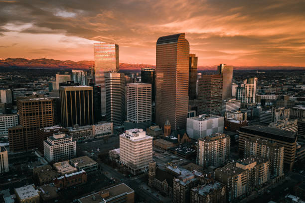 Aerial drone photo - Sunrise over city of Denver Colorado A fiery sunrise over the skyline of Denver denver stock pictures, royalty-free photos & images