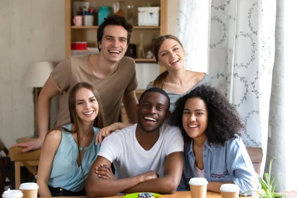 istock Diverse millennial attractive positive people smiling looking at camera 1071116564