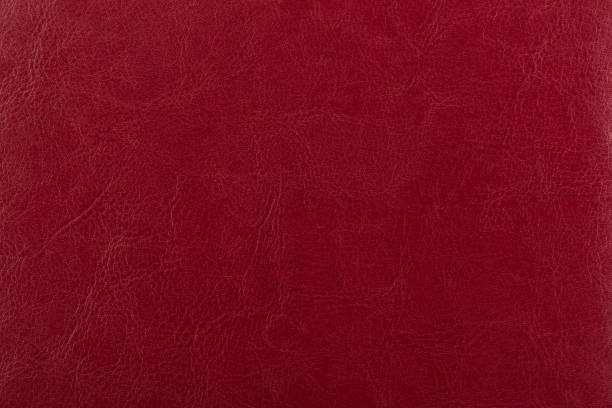 темно-красная кожаная поверхность в качестве фона, кожаная текстура. концепция текстуры кожи. - cow hide textured print стоковые фото и изображения
