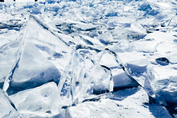 istock Blocks of ice gleaming in the sun. Arctic winter background. 1071123718