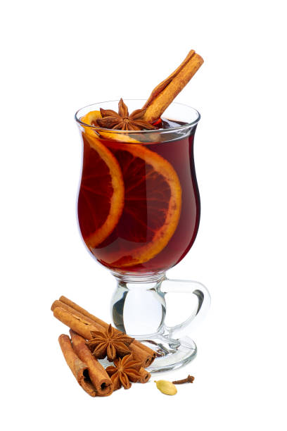 istock Mulled wine with orange slices and cinnamon on white 1071124044