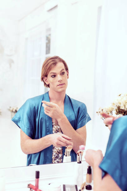 istock Uncertain short-haired young boy being gender-queer male 1071126122
