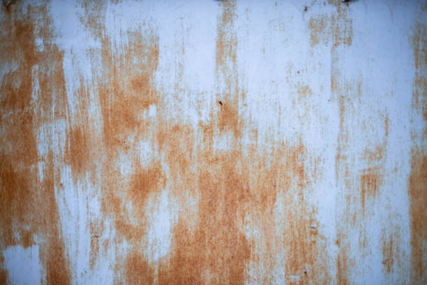 istock metal surface painted with blue paint and covered with rust 1071133914