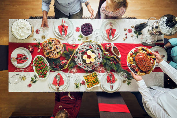 istock Christmas Dinner with Glazed Holiday Ham with Cloves and Vegetables 1071135626