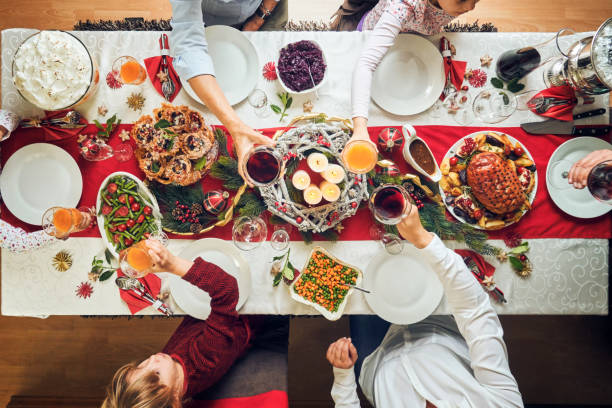 istock Christmas Dinner with Glazed Holiday Ham with Cloves and Vegetables 1071135630