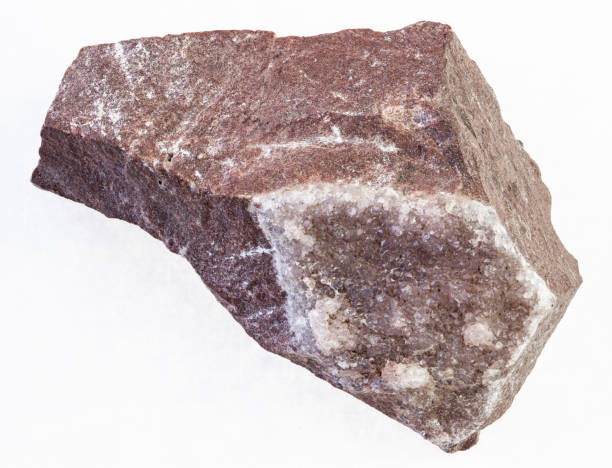 istock amethyst crystals on rock stone on white 1071136248