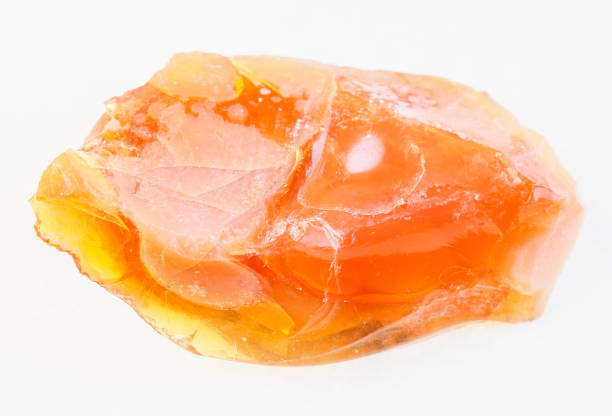 istock rough Fire and Noble opal stone on white 1071136298