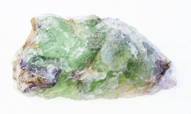 istock raw green Beryl with Alexandrite stone on white 1071136364