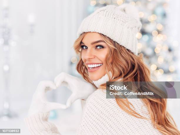 Beautiful Girl Sitting Near New Year Tree Stock Photo - Download Image Now - Christmas, Winter, Skin