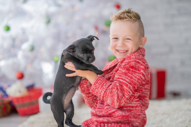 istock Cute kid and puppy 1071139200