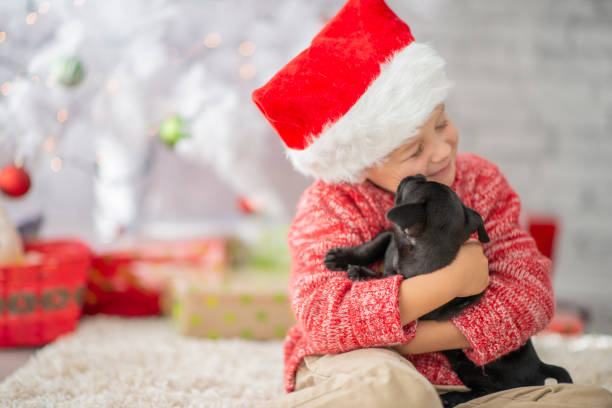 istock Little boy hugging his dog 1071139208