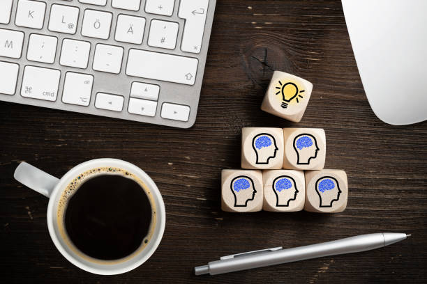 istock many people together having an idea symbolized by icons on cubes 1071139616