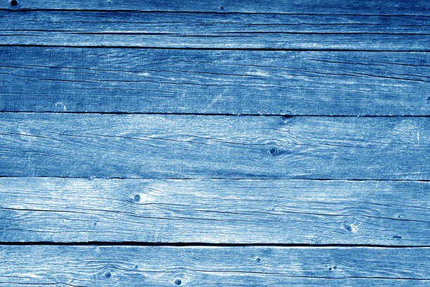 istock Old wooden wall in navy blue tone. 1071141990