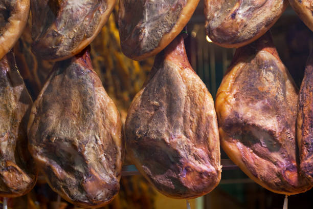 Hams exposed in the window of a butchery in Madrid.