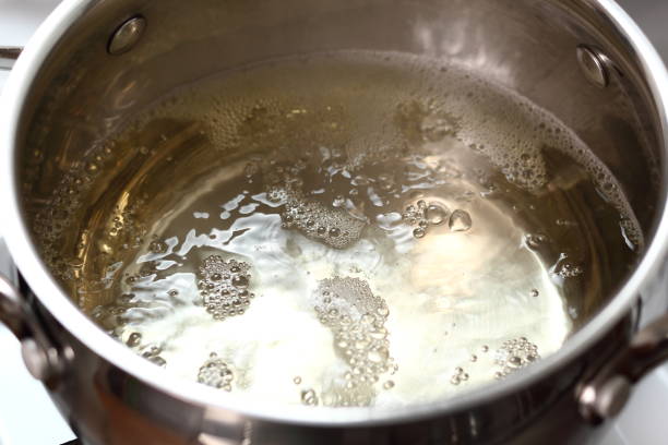 istock Boiling sparkling wine in saucepan 1071147610