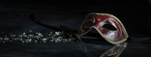 istock Carnival mask on black background, reflections, banner 1071148978