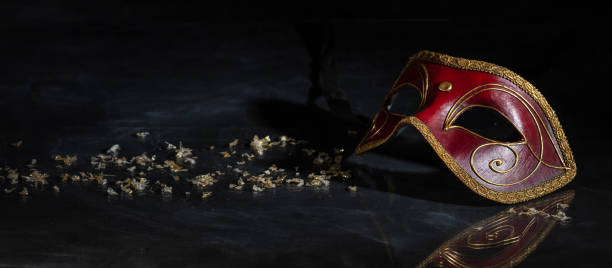 istock Carnival mask on black background, reflections, banner 1071148982