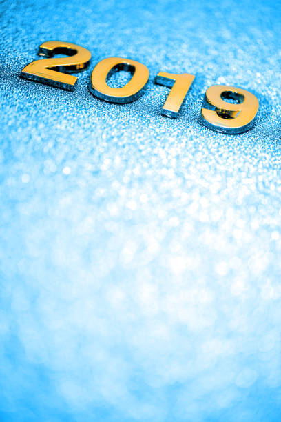 istock Golden New Year 2019 on a sparkling defocused background (blue) 1071151336