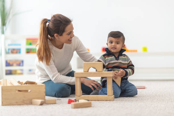 istock Mom playing with baby 1071151454
