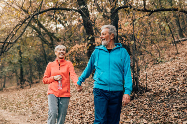 istock Happy fit couple holding hands 1071152612