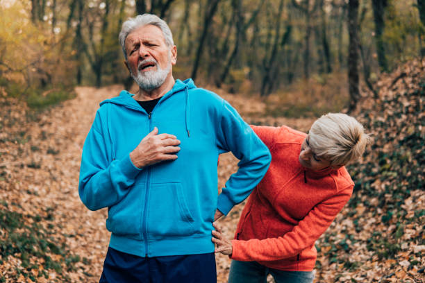 istock Woman helping husband with back pain 1071153650