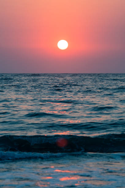 istock colorful sunset over the ocean 1071154174