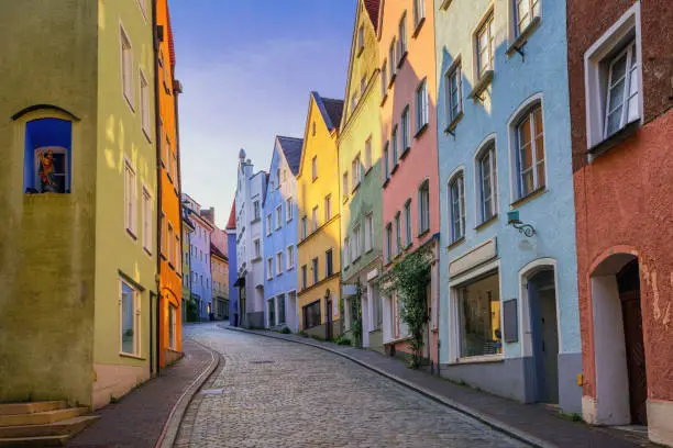 Traditional colorful gothic houses on a narrow street in the Old Town of Landsberg am Lech near Munich, Bavaria, Germany