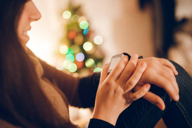istock Woman using smart watch at home 1071168318