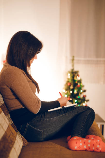 istock Woman writing something down in day planner 1071168458