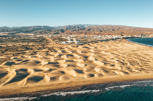 Aerial Maspalomas dunes view on Gran Canaria island near famous RIU hotel.