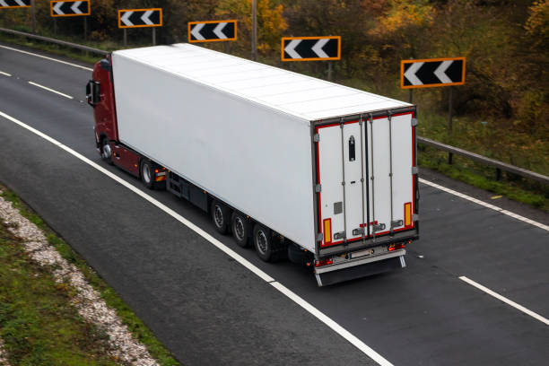 istock Articulated lorry in motion on the road 1071176822