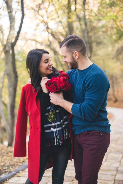 istock young couple in the park 1071181148