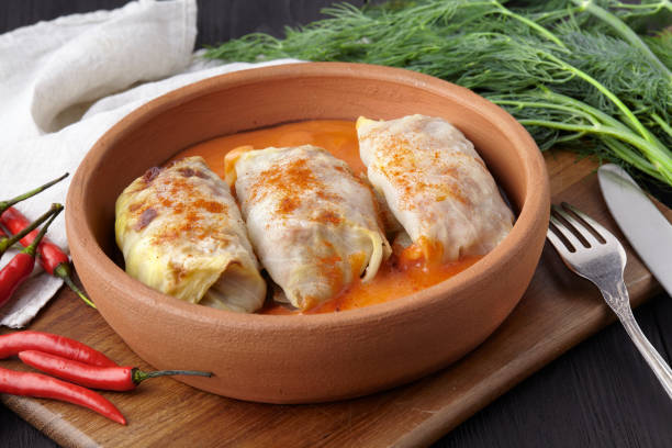 istock Stuffed cabbage leaves with minced meat and rice in tomato sauce. 1071183492