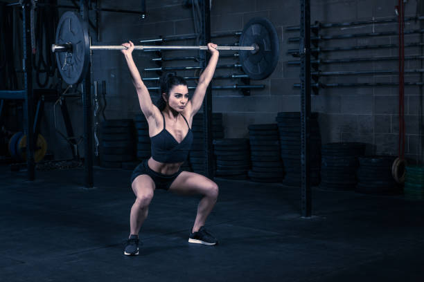 istock Female Fitness Model Working Out 1071187614