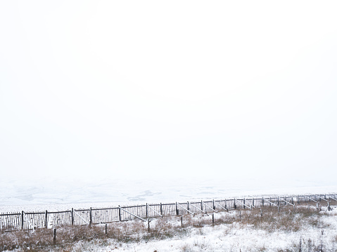 A white out following a snowy morning over the Peak District National Park as seen from Woodhead Pass