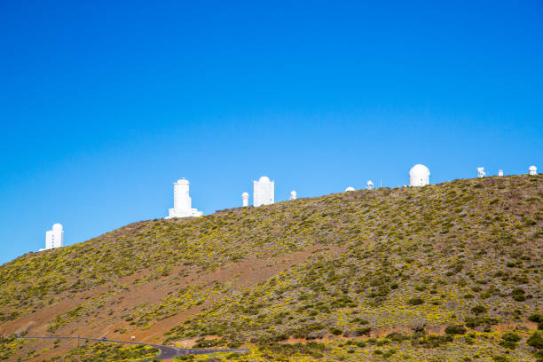 Astro physical observatory on the slopes of Teide volcano Astro physical observatory on the slopes of Teide volcano on Tenerife island observatory tenerife canary islands el teide national park stock pictures, royalty-free photos & images