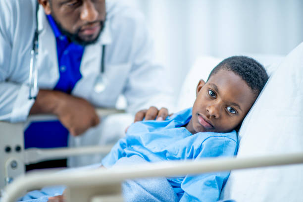 istock Sad Boy At Hospital 1071201472