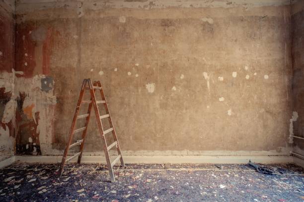 istock ladder in empty room during renovation - home decoration, restoration concept 1071206140