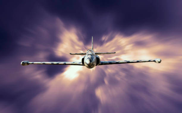 istock Military jet fighter airplane flying above the clouds 1071215012