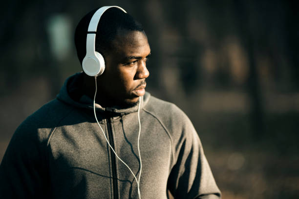 istock Young man listening to music 1071217276