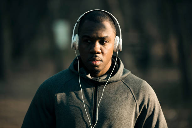 istock Young man listening to music 1071218980